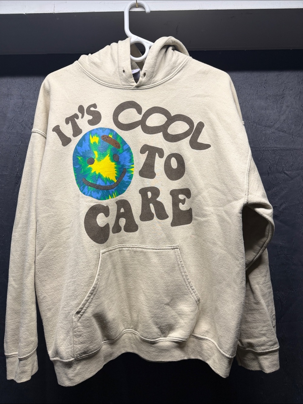 LONELY GHOST Cream Hoodie with Multi‑Color Tie‑Dye Smiley
